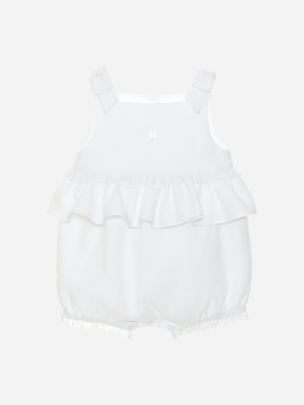 White piquet overall with frill and bows
