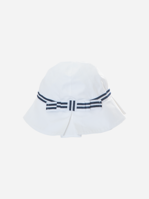White hat decorated with a striped bow